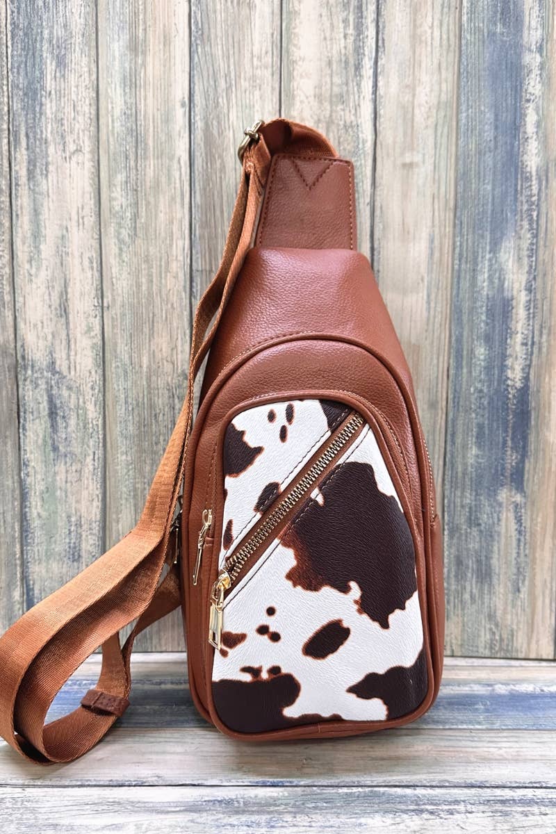 Bolso bandolera con estampado de vaca de Desheng Enterprise (marrón)